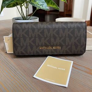 BNWT: brown + acorn Jet set travel MK wallet.